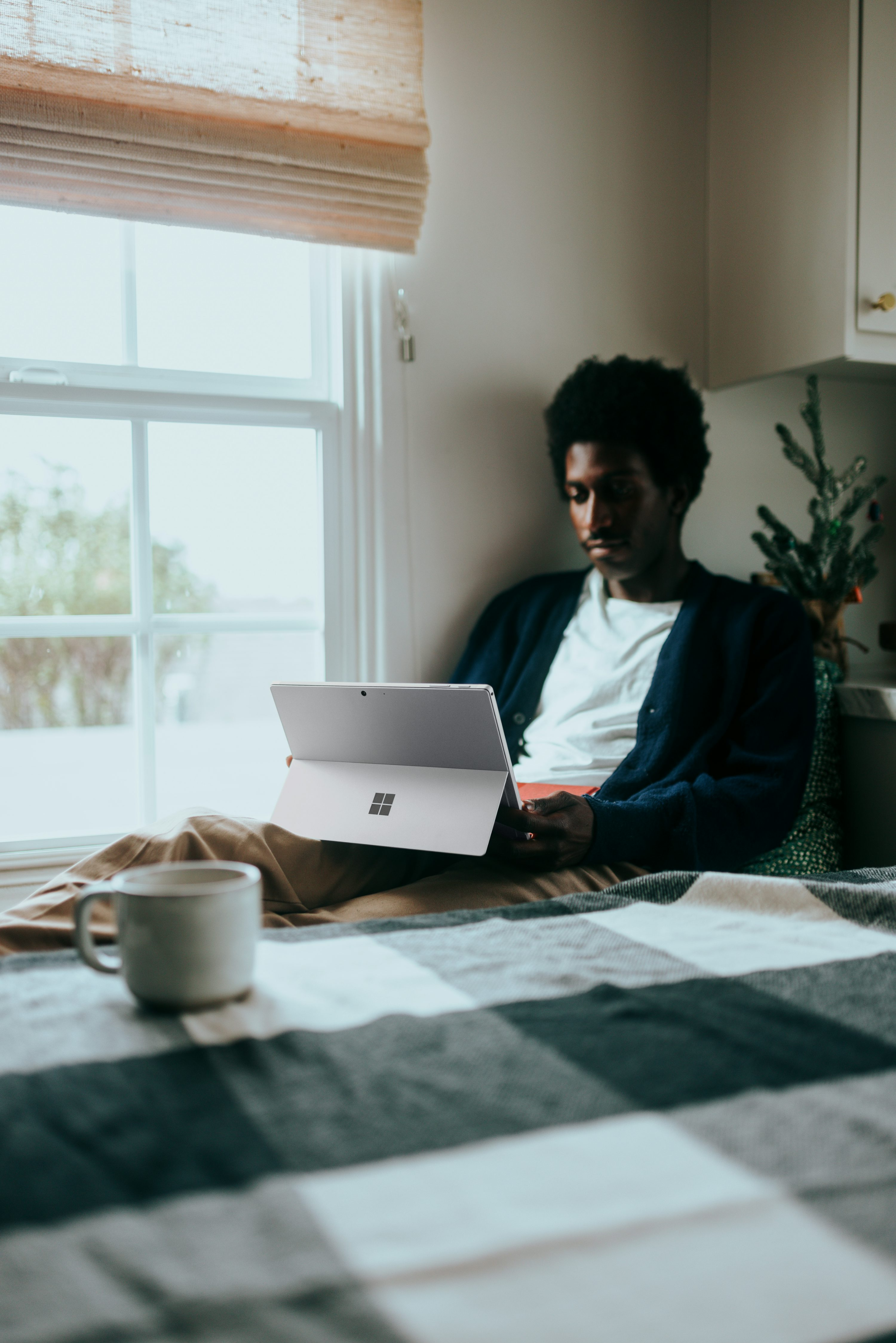 an image of a Person working on tablet